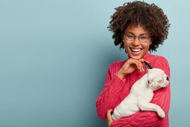 Happy pet owner at The Animal Doctor
